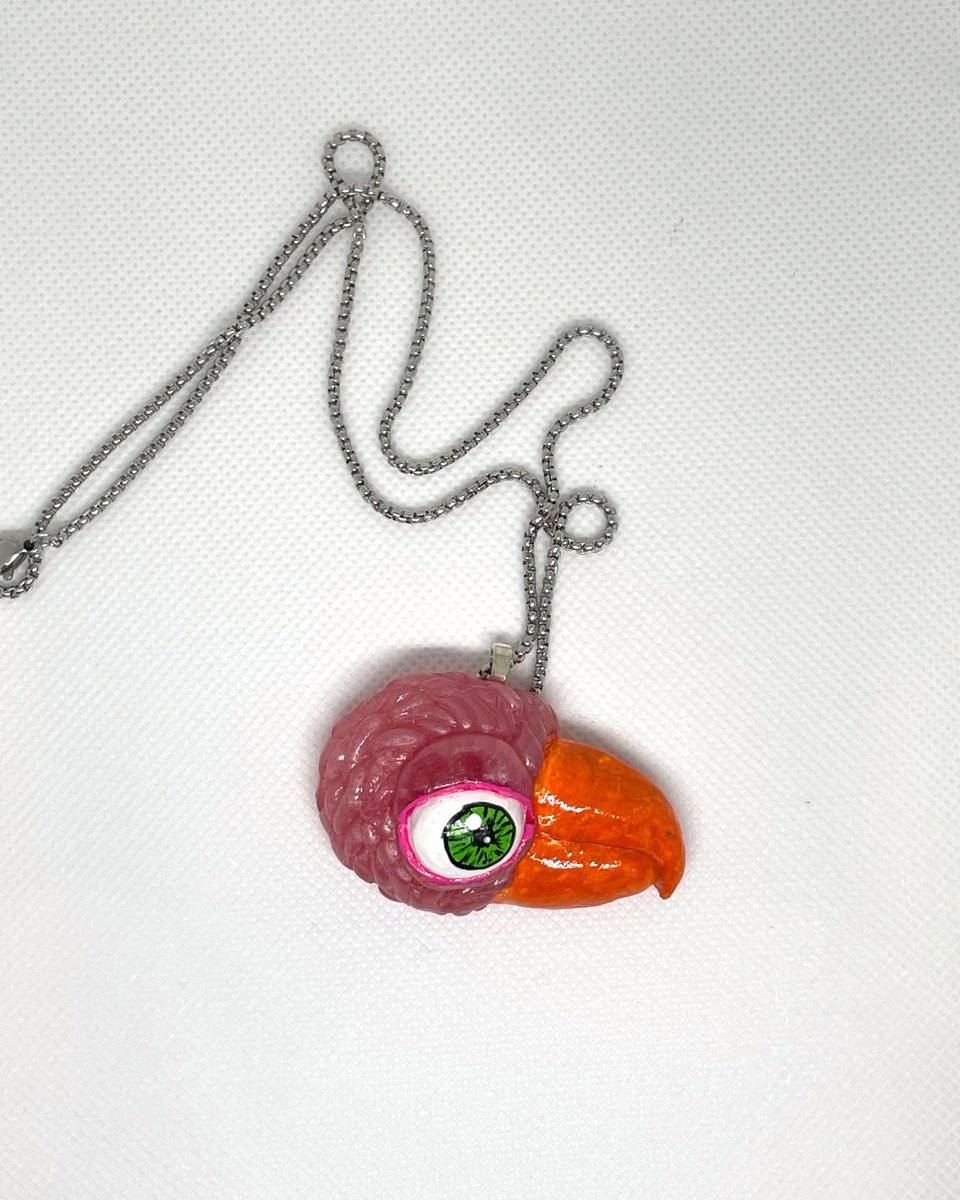 Creature Head Pendant: Pink parrot, orange beak